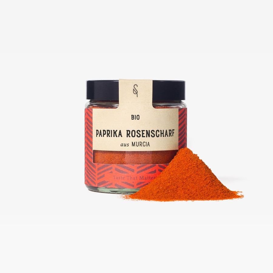 Paprika rosenscharf Murcia mit Gewürzhaufen